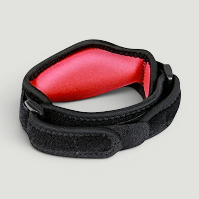 Padel Shark Compression Anti Tennis Elbow brace with red lining and adjustable black straps.