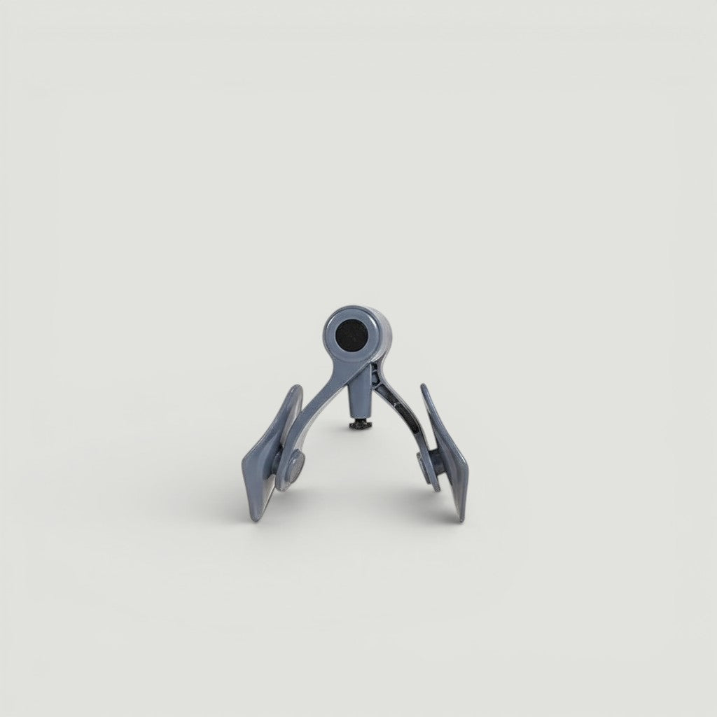 Padel Shark adductor machine for thigh and inner thigh workout, grey plastic, used by a man in workout shorts.
