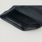 Padel Shark black compression forearm sleeve with non-slip silicone strip for optimal support during padel matches.