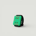 Padel Shark green wristband score counter for tracking points and games during play. Features red lettering.